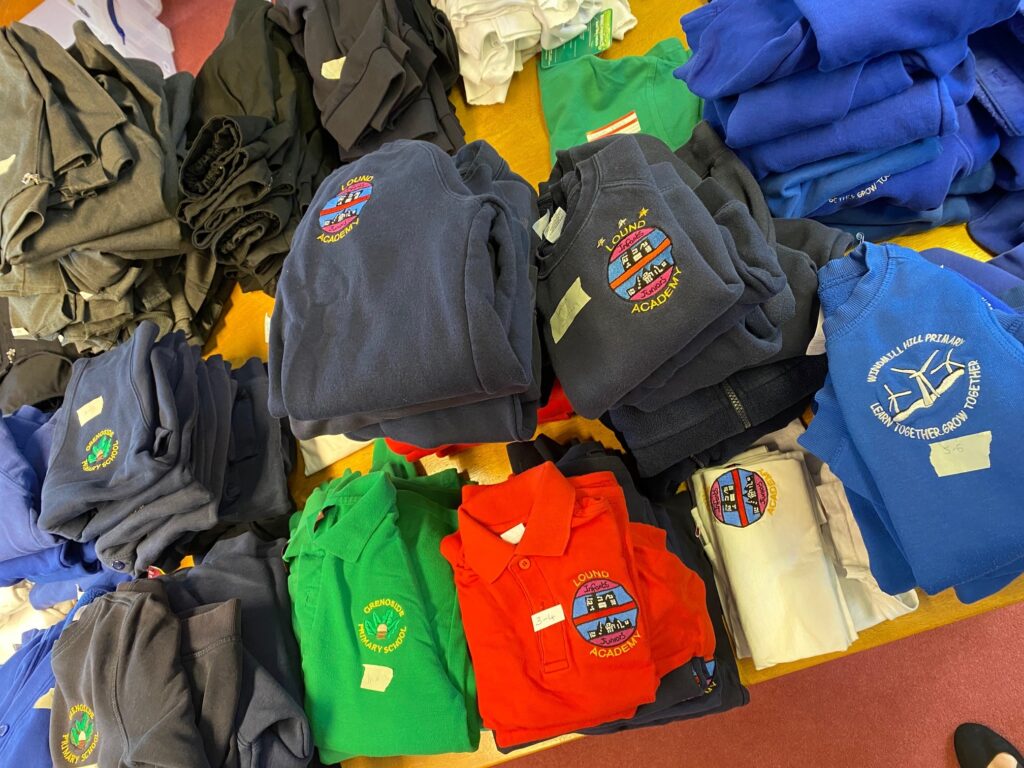 school uniforms on a table
