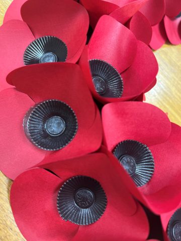 close up photo taken of royal british legion poppy wreath